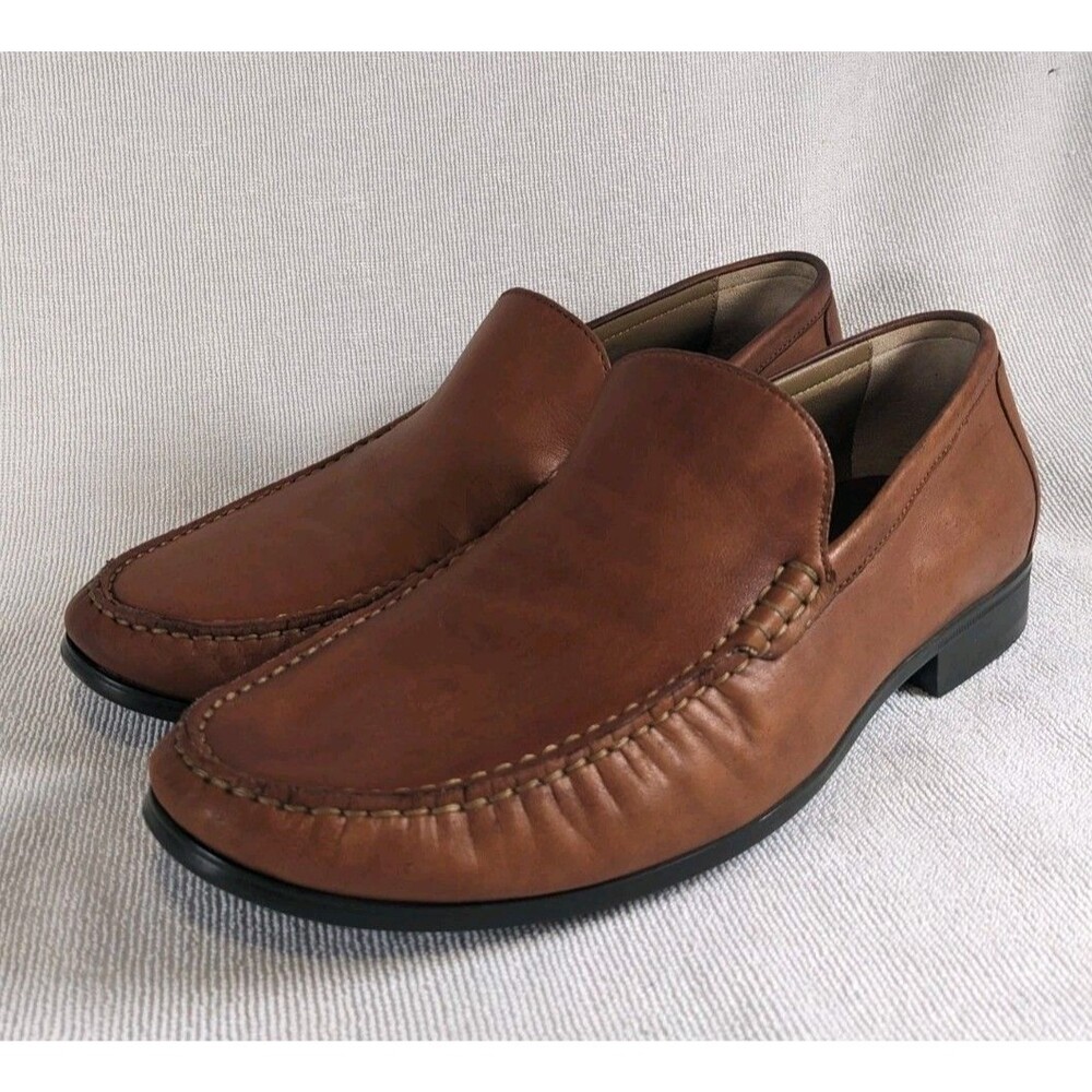 Johnson and merphy size 11 Mens brown venetian loafers.